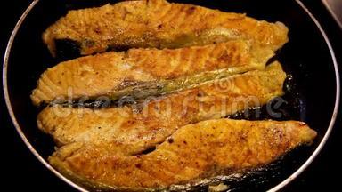 三文鱼片是用橄榄油在煮锅上煎的。 新鲜鲑鱼-海鲜。 高清格式